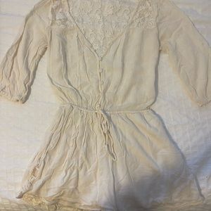 Cream with lace hollister romper size medium